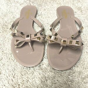 Authentic Valentino bow flip flops. Worn only a few times.